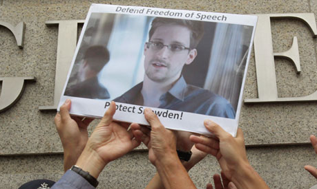 Edward Snowden supporters demonstrate outside the US consulate in Hong Kong..png