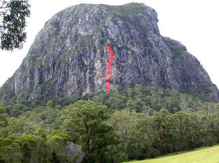 Glass House Mountains Mount Tibrogargan from the right side, note there is very few holes except at the front with the aboriginals face but notice here a possible crease mark from cannon shot that skimmed passed its side.jpg
