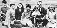 A teenage Ernesto (left) with his parents and siblings, c. 1944.png